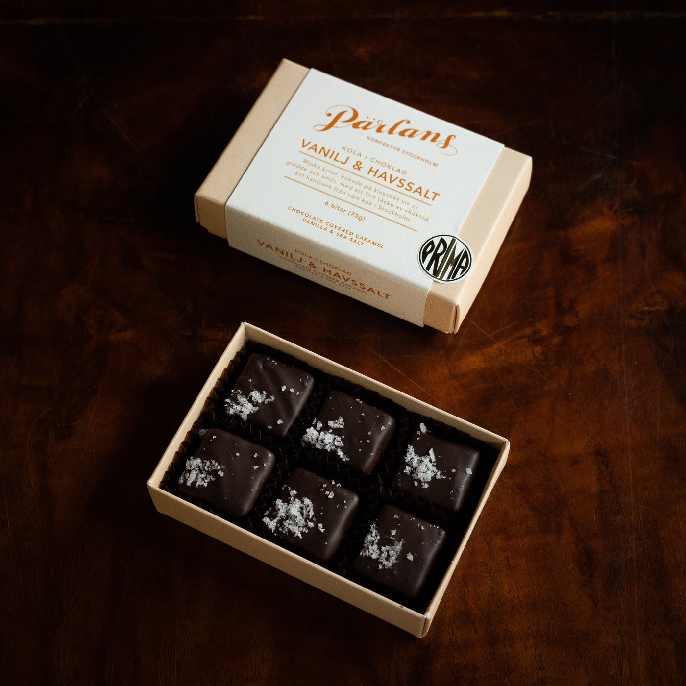 A charming box with six pieces of your favourite caramel, dipped in chocolate. Treat yourself or someone you love! <br><br>VANILLA & SEA SALT – A silky smooth, chocolate covered caramel with a sprinkling of sea salt that enhances the warmth of Bourbon vanilla.