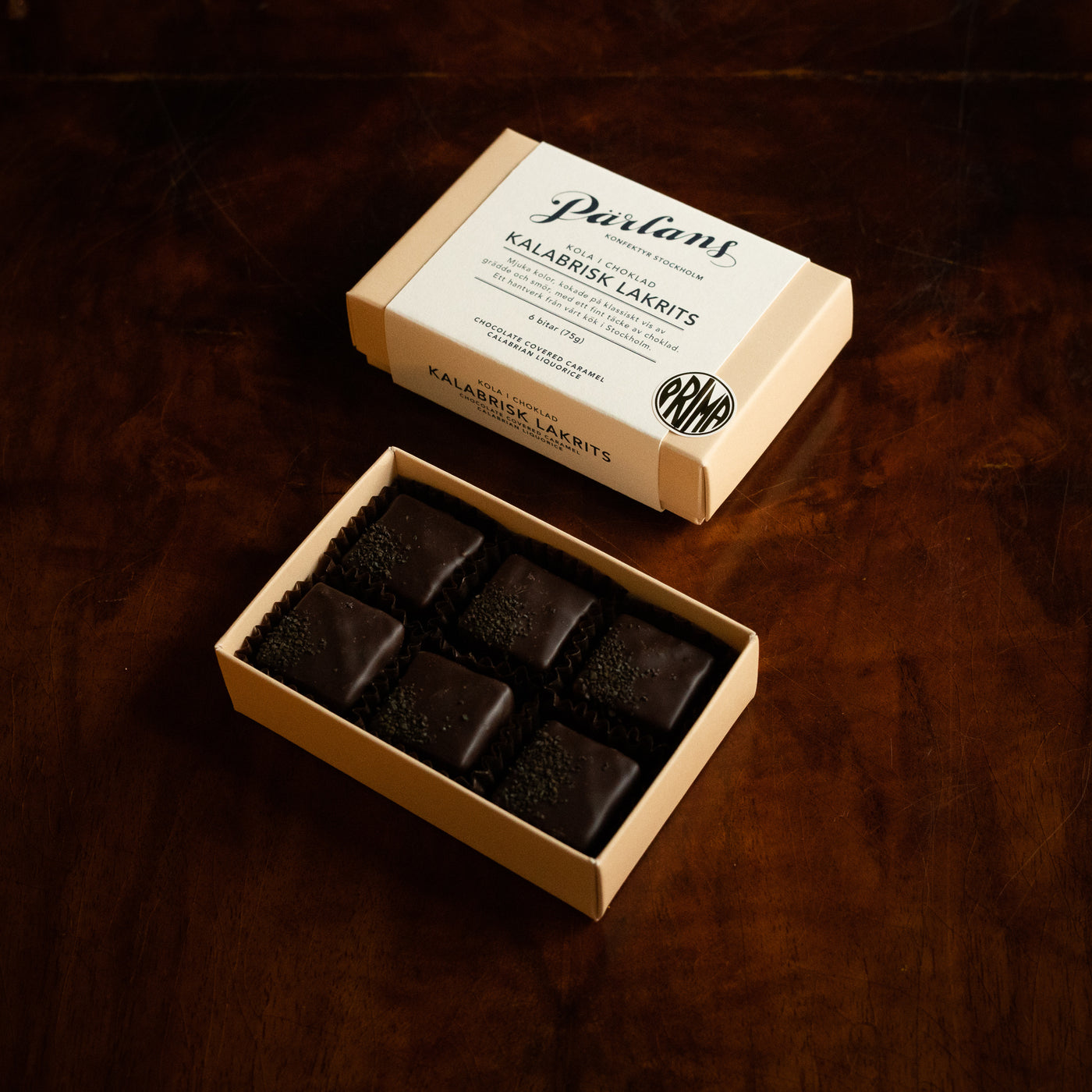 A charming box with six pieces of your favourite chocolate covered caramel. Treat yourself or someone you love! <br><br>CALABRIAN LIQUORICE – A rich caramel with the sweet taste of Italian liquorice and a pinch of sea salt. Dipped in dark chocolate, with a touch of liquorice crunch on the top. This dark treasure is pure perfection!