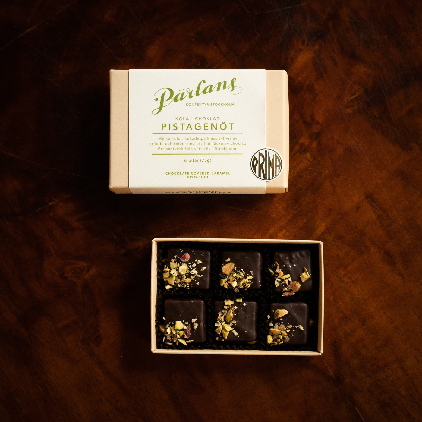 A charming box with six pieces of your favourite chocolate covered caramel. Treat yourself or someone you love! <br><br>PISTACHIO – smooth and buttery caramel with crunchy chunks of roasted pistachio and a hint of sea salt, dipped in a thin layer of chocolate.